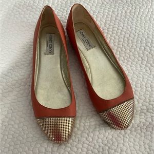 Jimmy Choo flats with gold studded toe